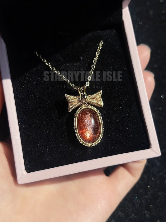 Ruby Bow Hematoid Quartz Pendant Necklace