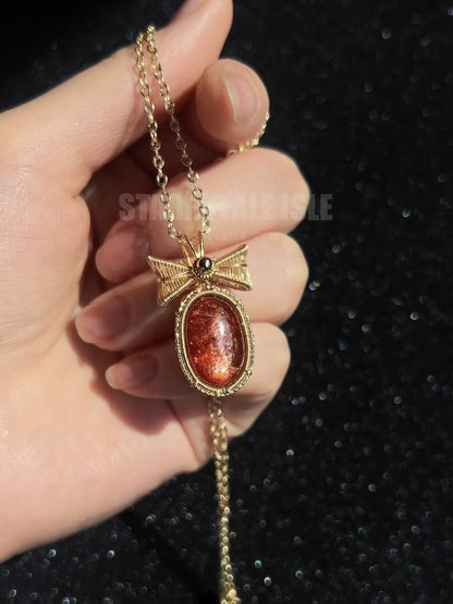 Ruby Bow Hematoid Quartz Pendant Necklace