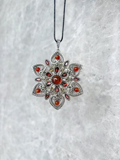 The Baoxiang Flower Garnet Pendant & Brooch